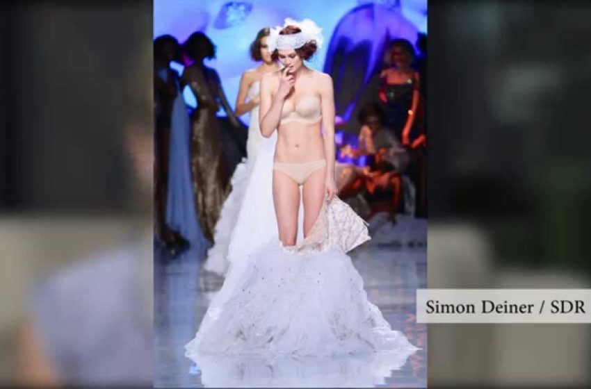  Models strip on the runway at Fashion Week Africa