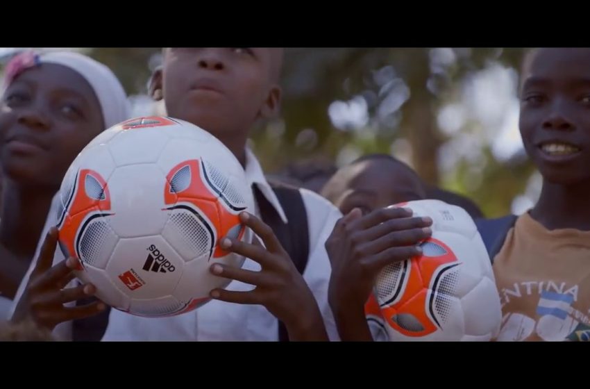  Africa Football: Children playing plastic balls are given a real one. A magic moment !