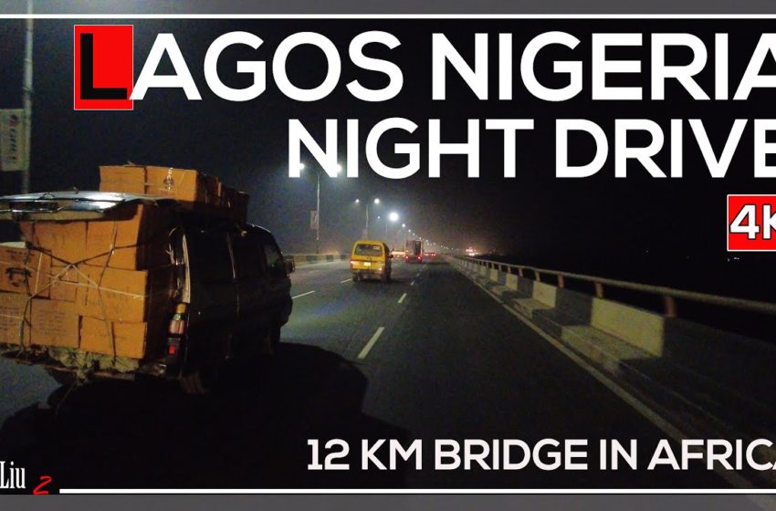  Travel Africa : Crossing the 12 km Third Mainland Bridge by night on a motorcycle in LAGOS Nigeria
