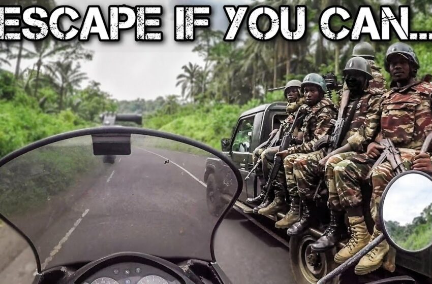  ESCAPE from a COUNTRY at WAR  | Motorcycle World Tour | Africa #51